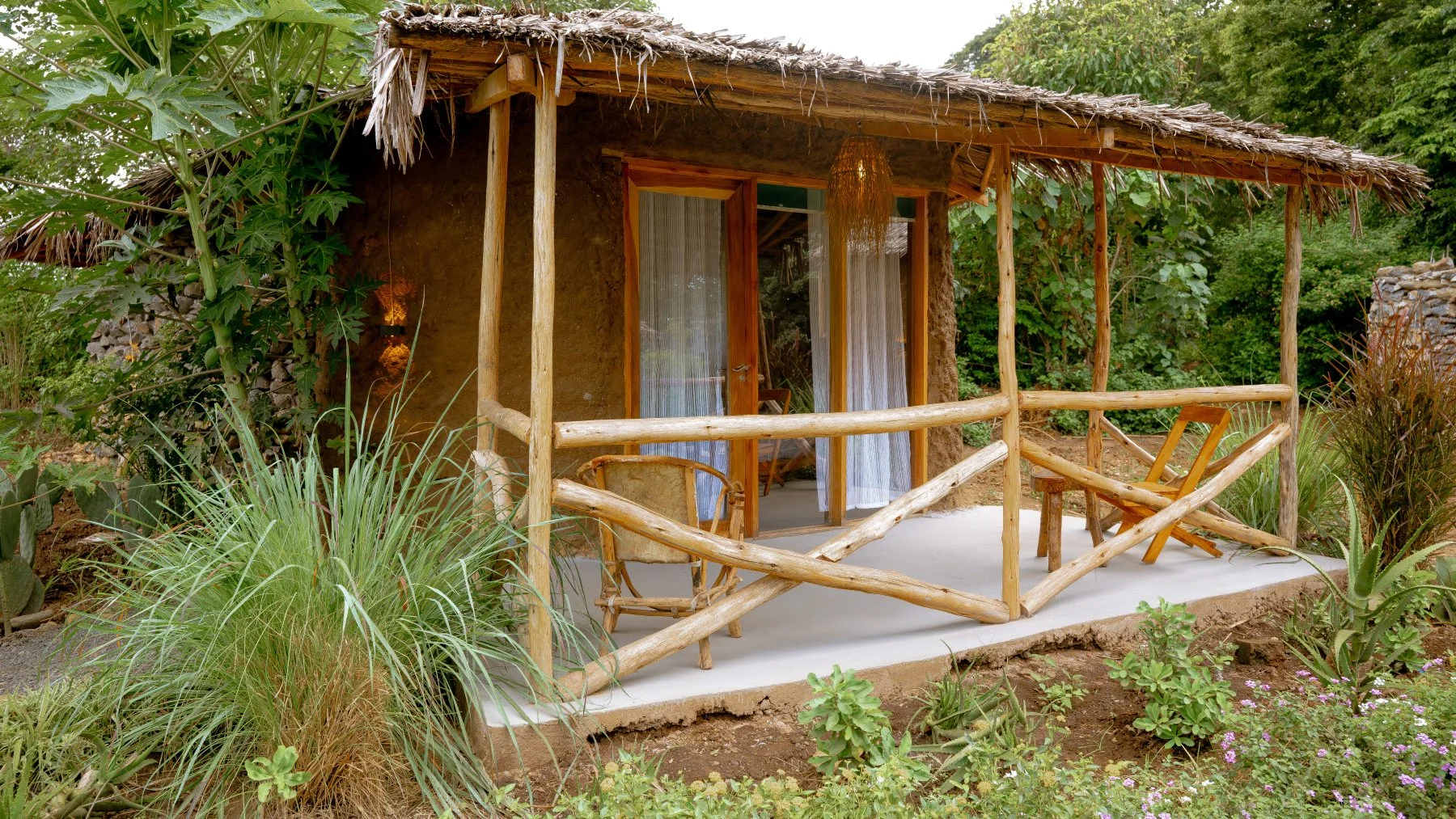 The veranda of a guest hut at Sio Maasai lodge beside the Usa River