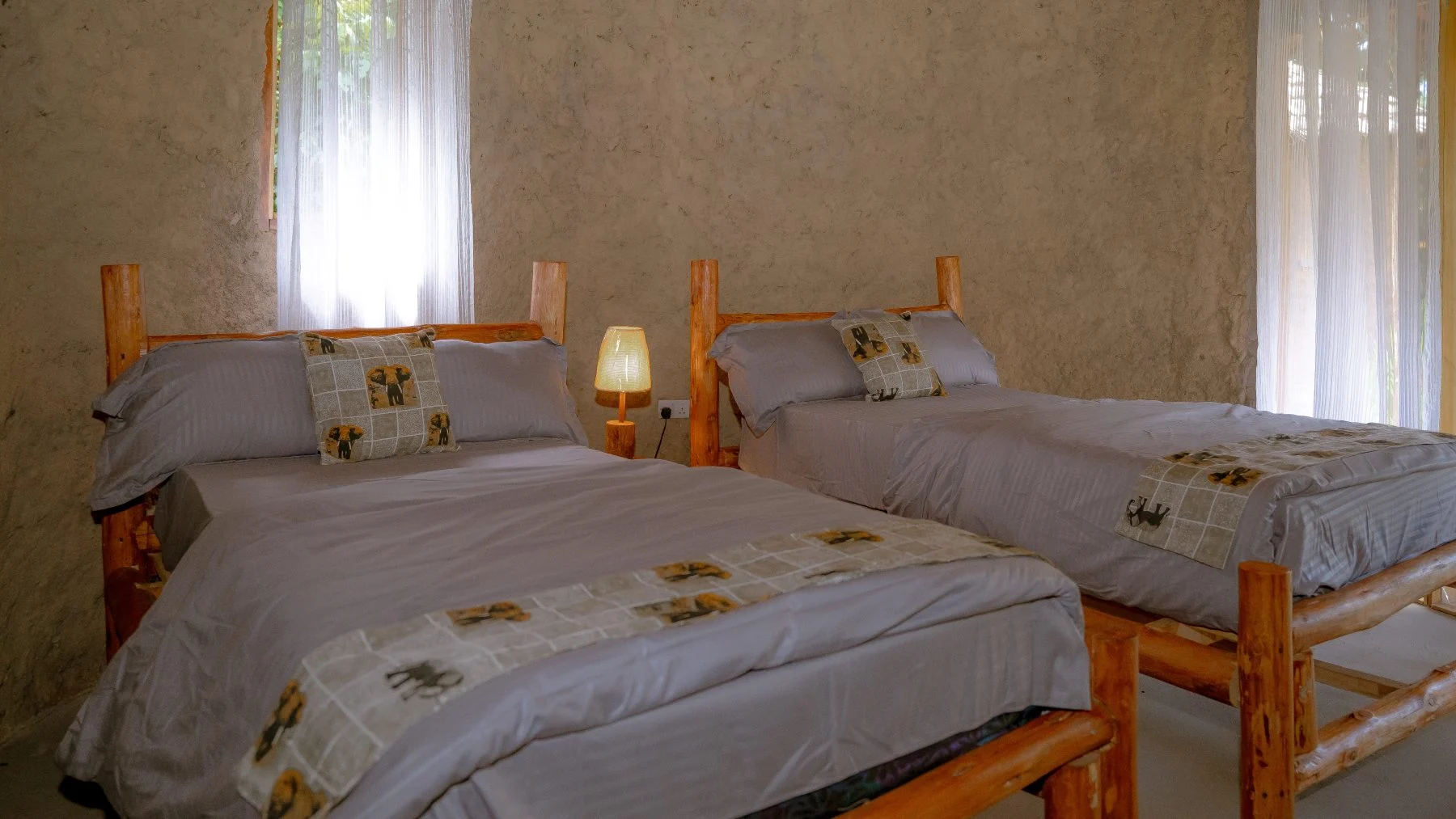 The two single beds in the Standard Twin Room at Sio Maasai